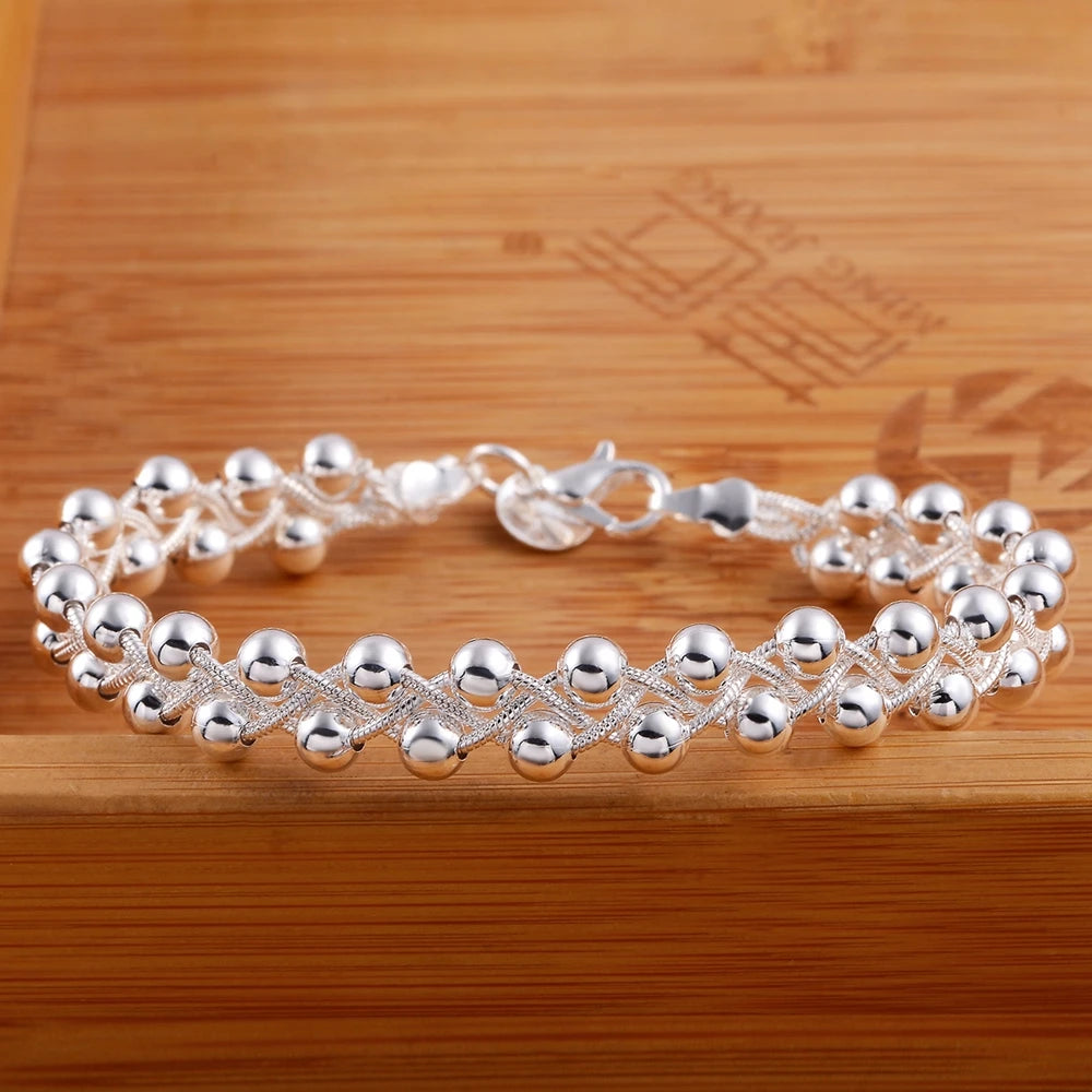 The Aurelia Pearl Charm Bracelet