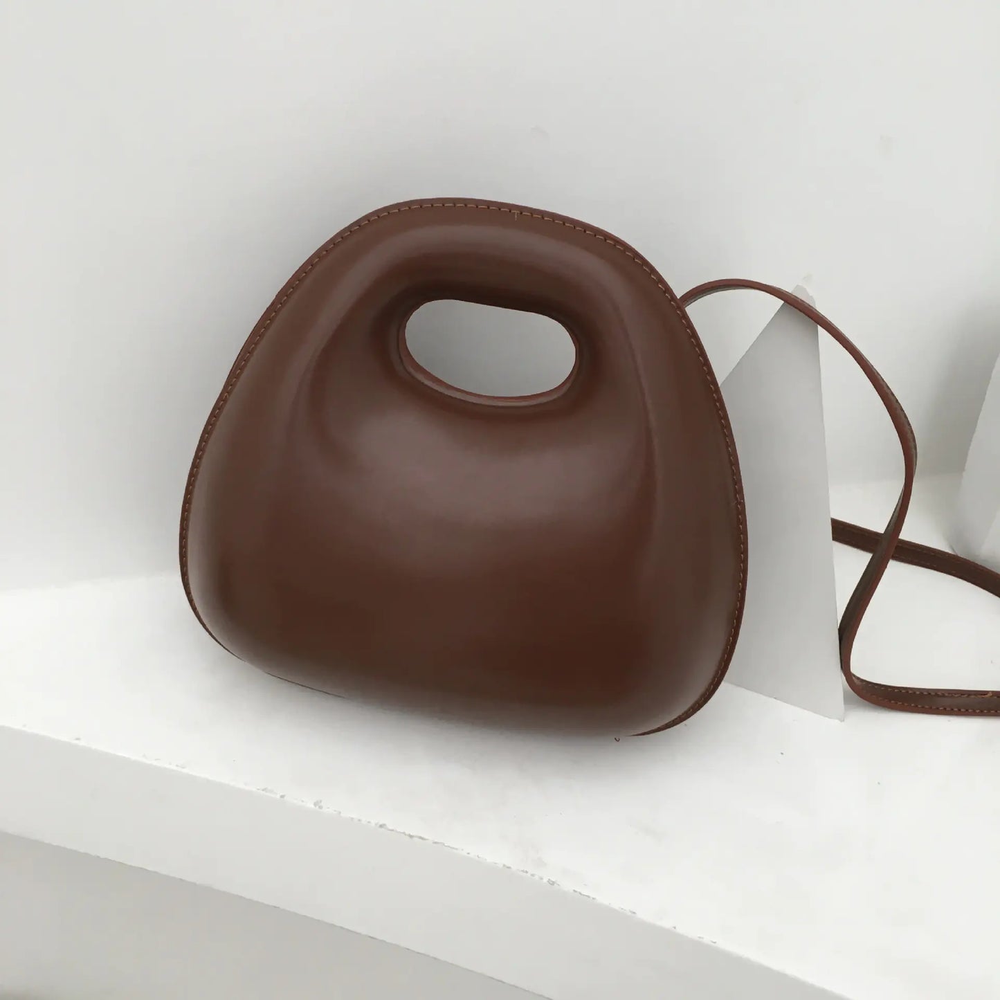 The Nomi Clutch